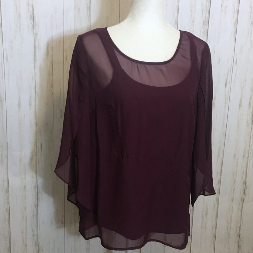 Maroon sheer long sleeve blouse with tank under.